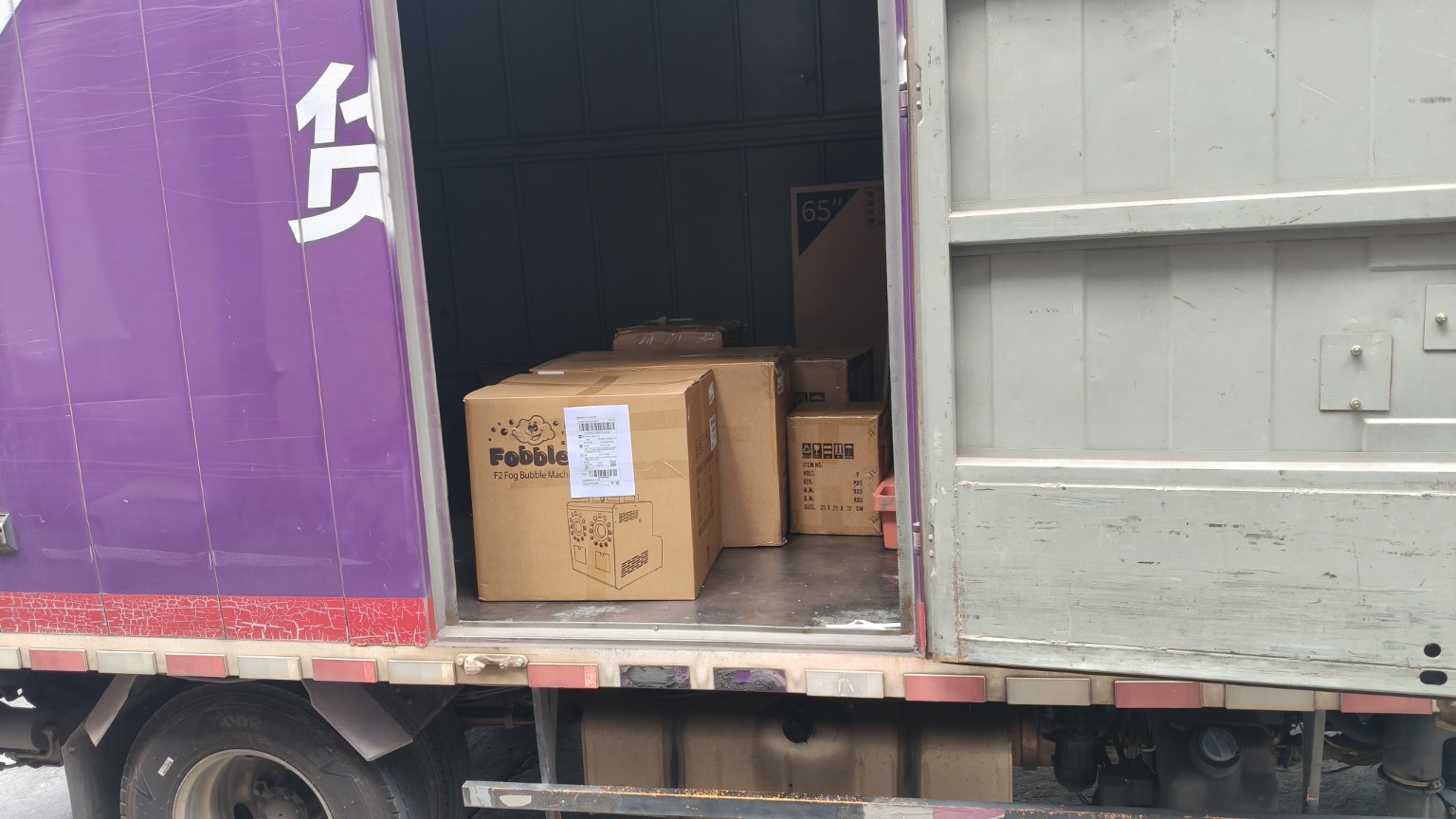 Boxes of stage-effects equipment loaded into a freight truck